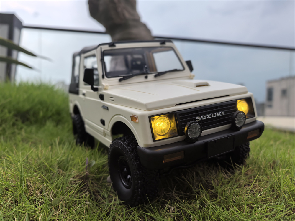 WPL C74-1 1/10 2.4G 4WD RTR Rc Car For SUZUKI JIMNY JA11 Truck Crawler Vehicle M banner 1